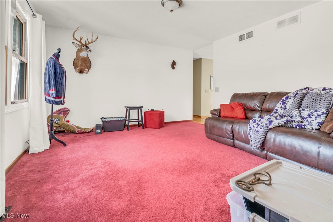 1648 Cassell Road Butler, OH 44822 - Photo 10 of 36 Living room featuring carpet floors