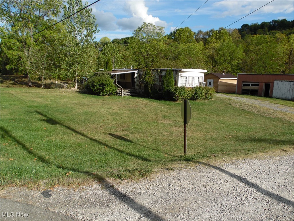 19559 Salt Run Road Caldwell, OH 43724 - Photo 1 of 8 View of front of property with an outbuilding and a front yard