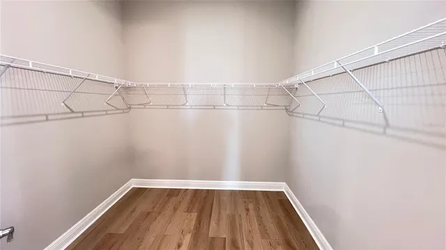 a view of a room with racks on the wall