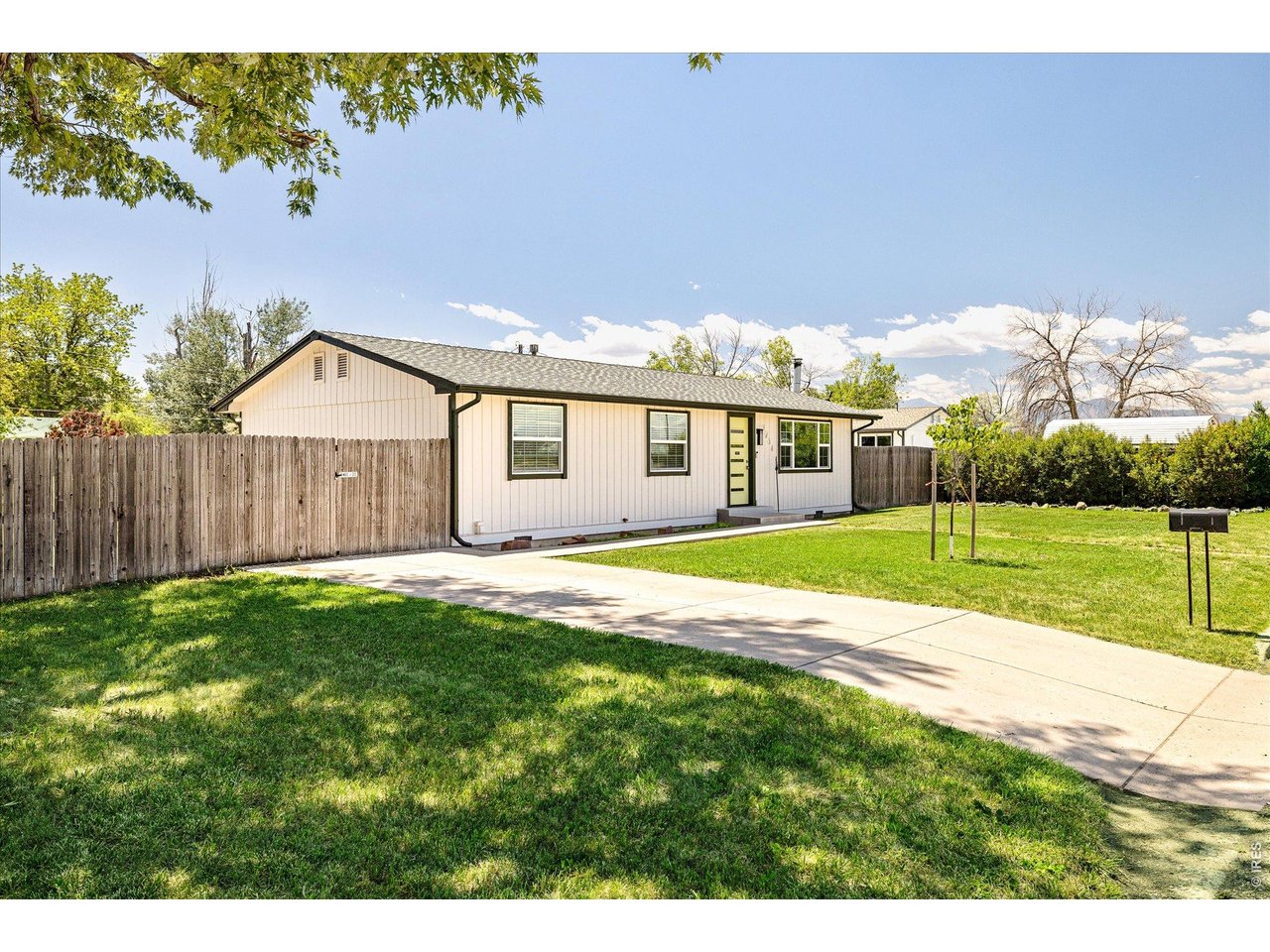 9234 Arapahoe Road Boulder, CO 80303 - Photo 8 of 43 charming single-level home with mature shade tree, spacious front yard and extended driveway for ample off-street parking