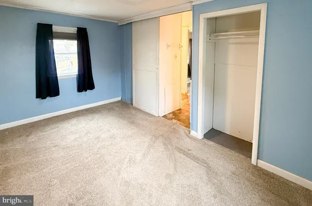 a bathroom with a toilet sink and a bathtub