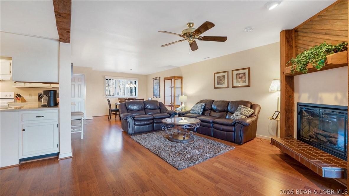 5940 Baydy Peak Road, Unit 123 Osage Beach, MO 65065 - Photo 3 of 43 cozy firplace