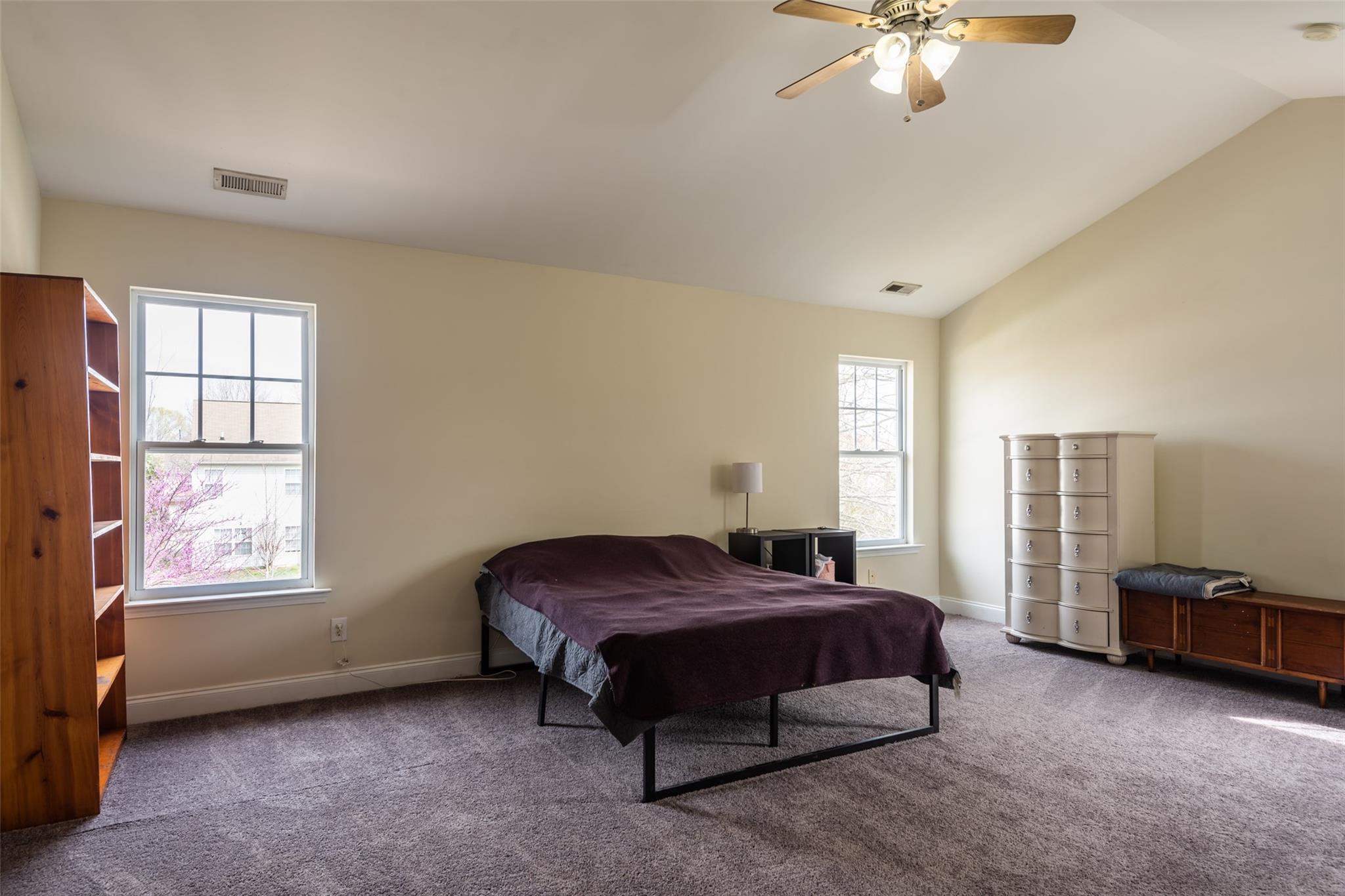 2012 Apogee Drive Indian Trail, NC 28079 - Photo 18 of 28 a spacious bedroom with a bed and a window
