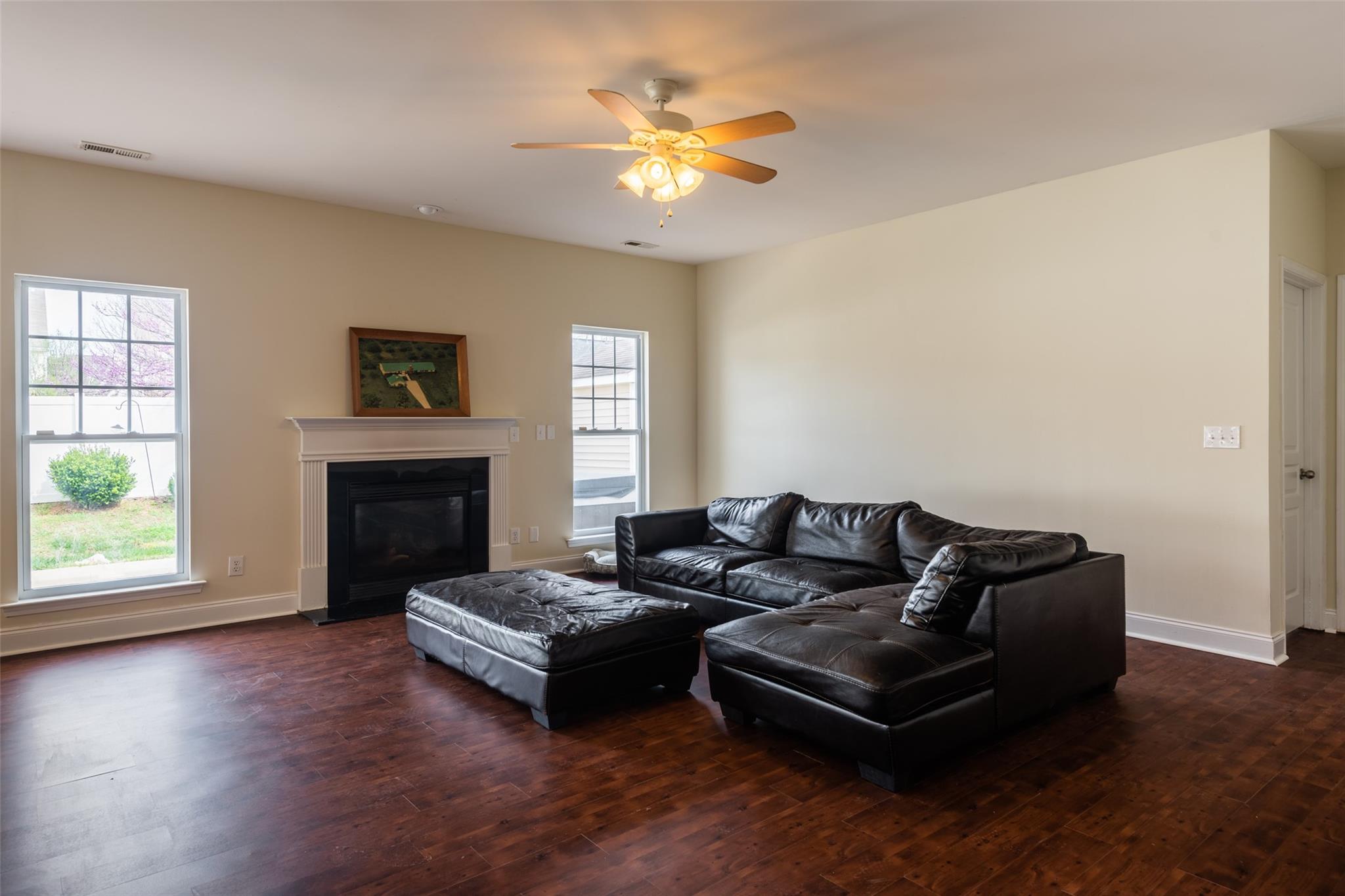 2012 Apogee Drive Indian Trail, NC 28079 - Photo 9 of 28 a living room with furniture and a fireplace