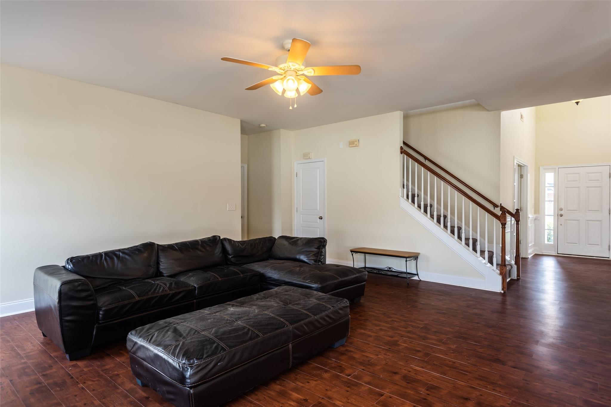 2012 Apogee Drive Indian Trail, NC 28079 - Photo 10 of 28 a living room with furniture and a chandelier