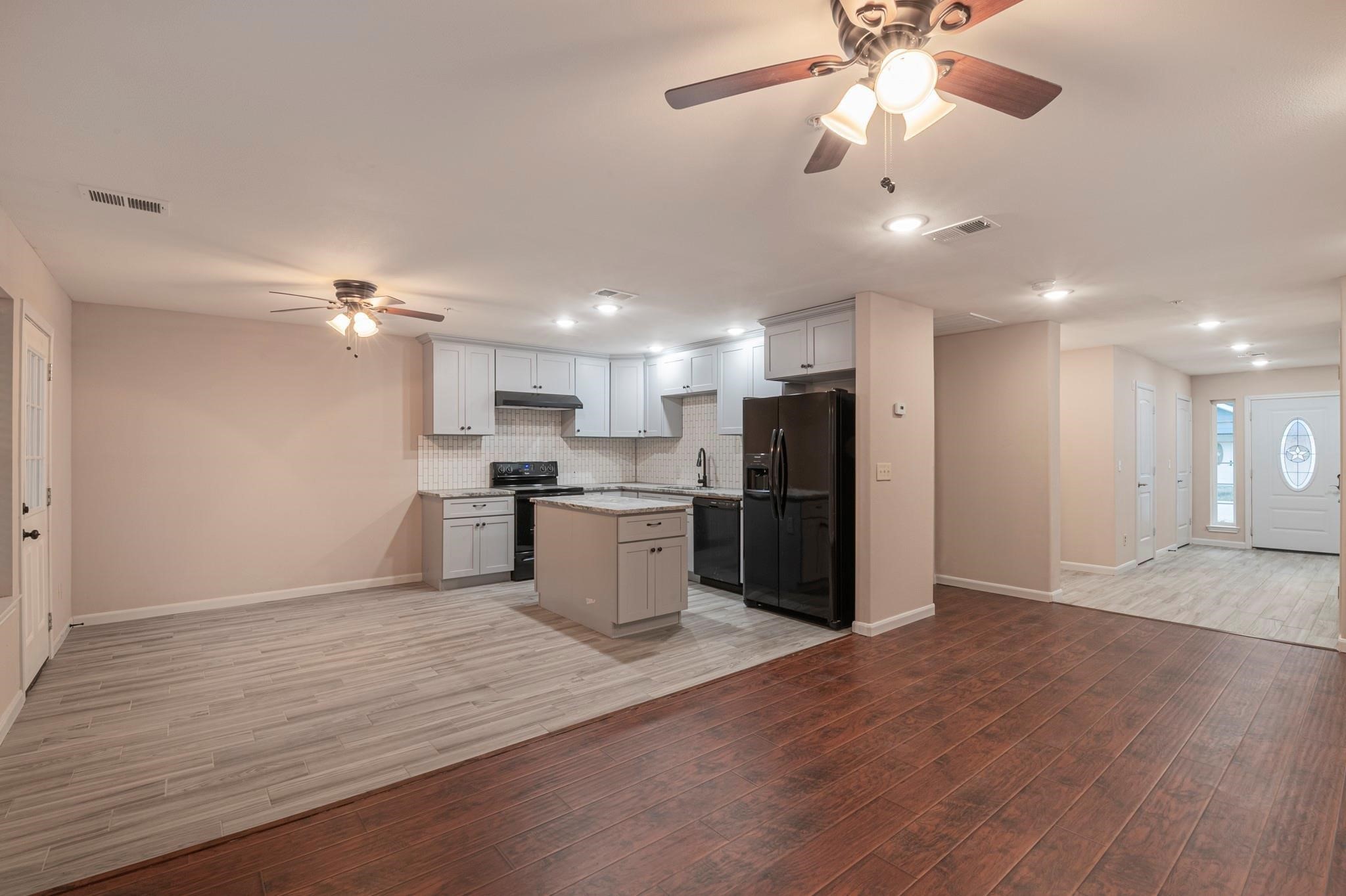 22262 Adams Street Porter, TX 77365 - Photo 4 of 11 Living Room area and Kitchen