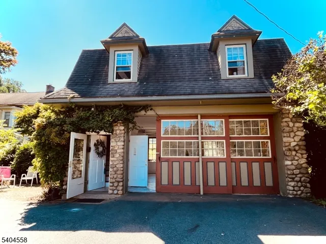 a bed room with bed and window