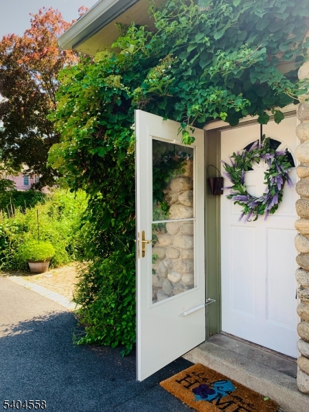 400 Church Street, Unit A Hackettstown, NJ 07840 - Photo 15 of 19 a front view of a house with a yard