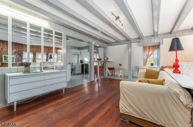 a bed room with a bed and a window