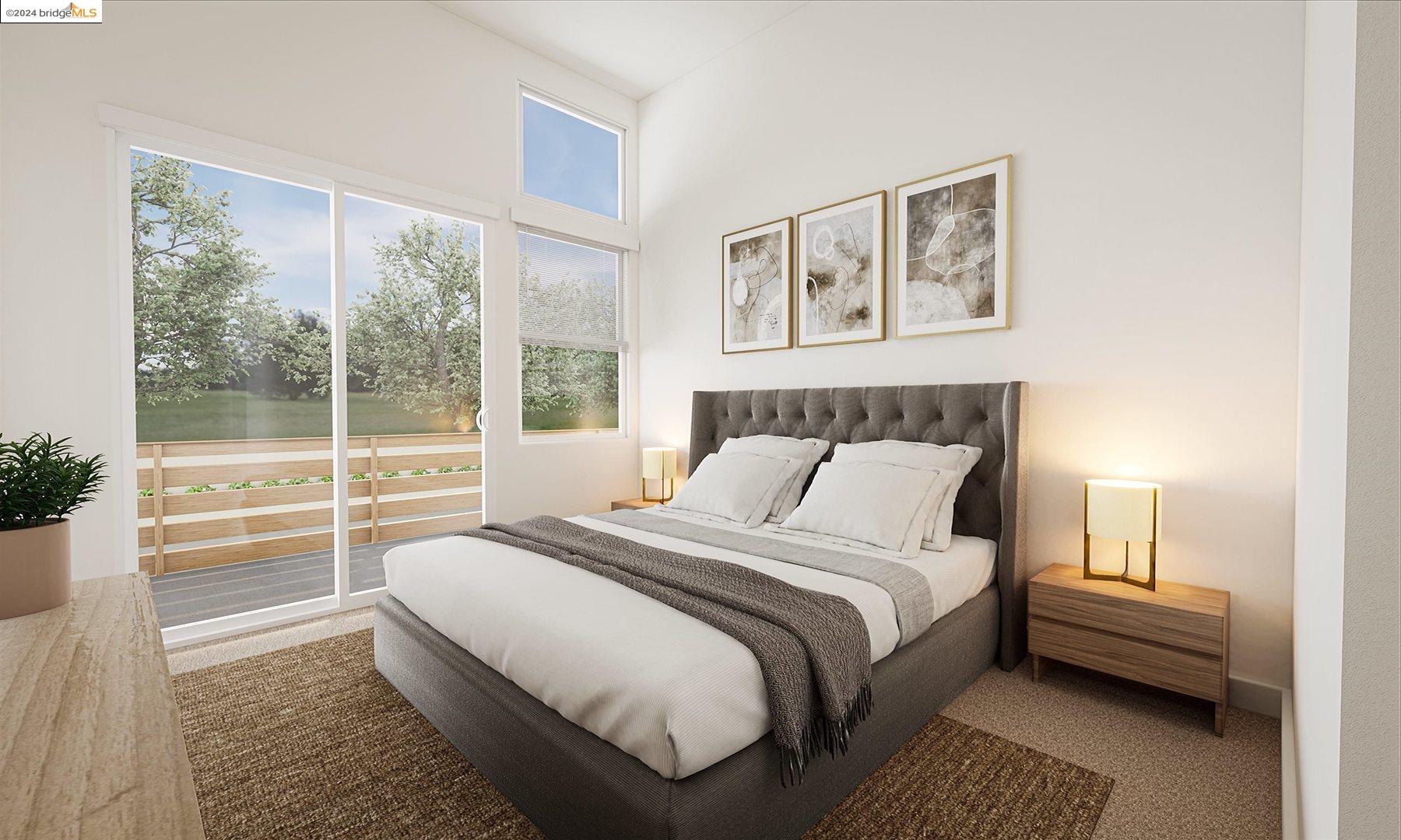 a spacious bedroom with a bed and a large window