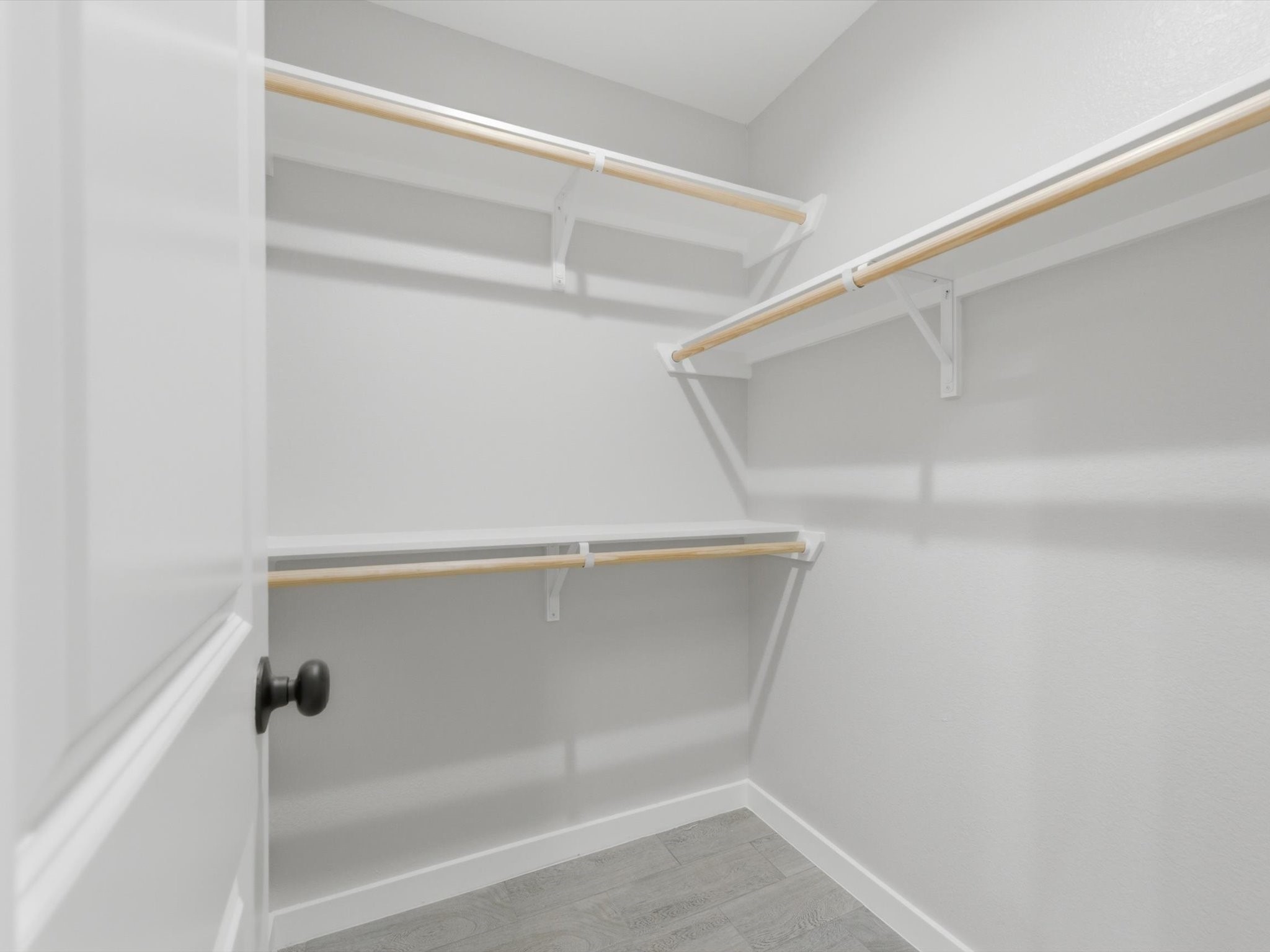 413 South 12th Street Conroe, TX 77301 - Photo 17 of 22 Master bedroom closet with ample space for a duplex.