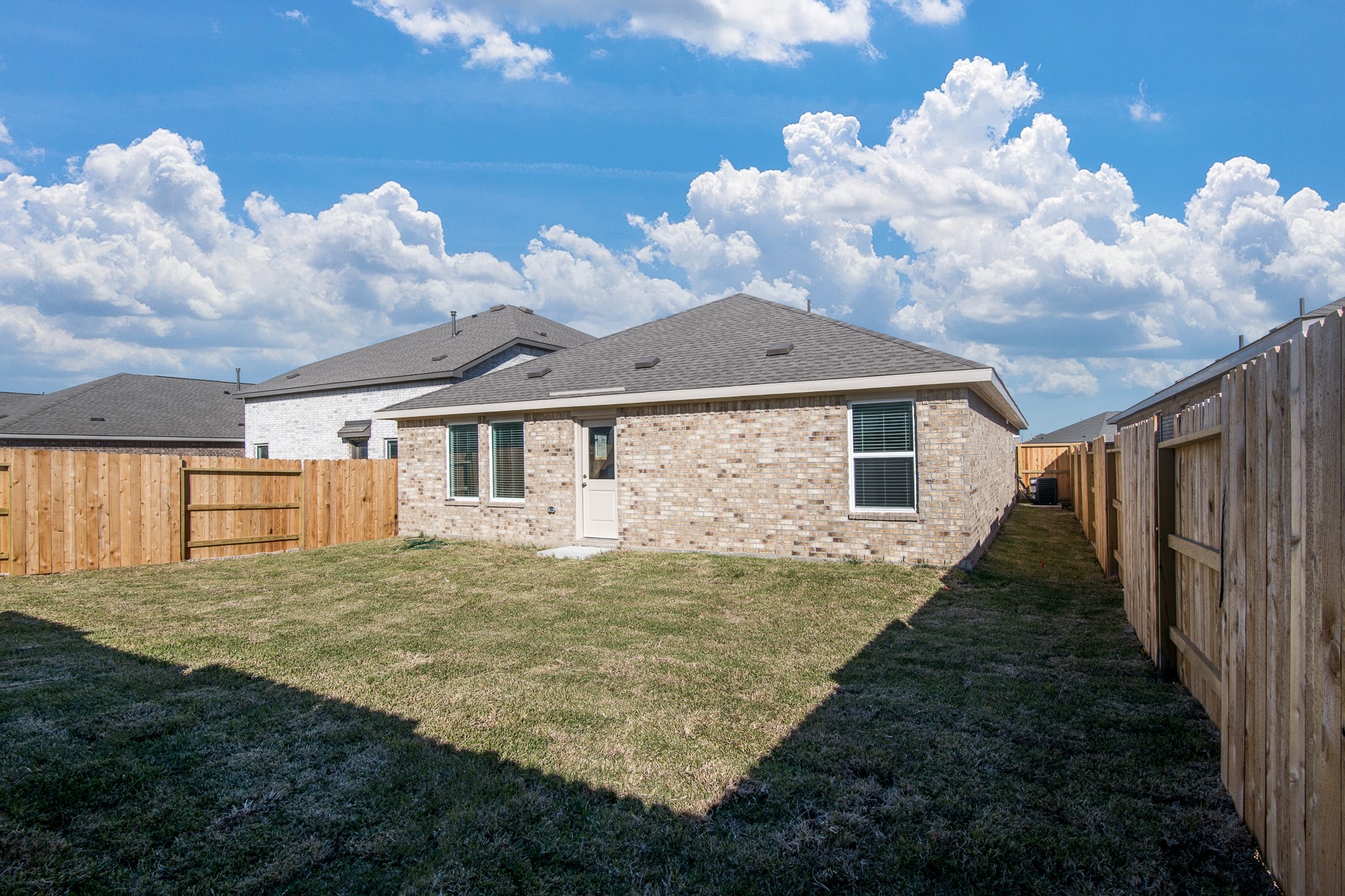 3013 Colusa Rdg Drive Katy, TX 77493 - Photo 14 of 15 a view of a house with backyard