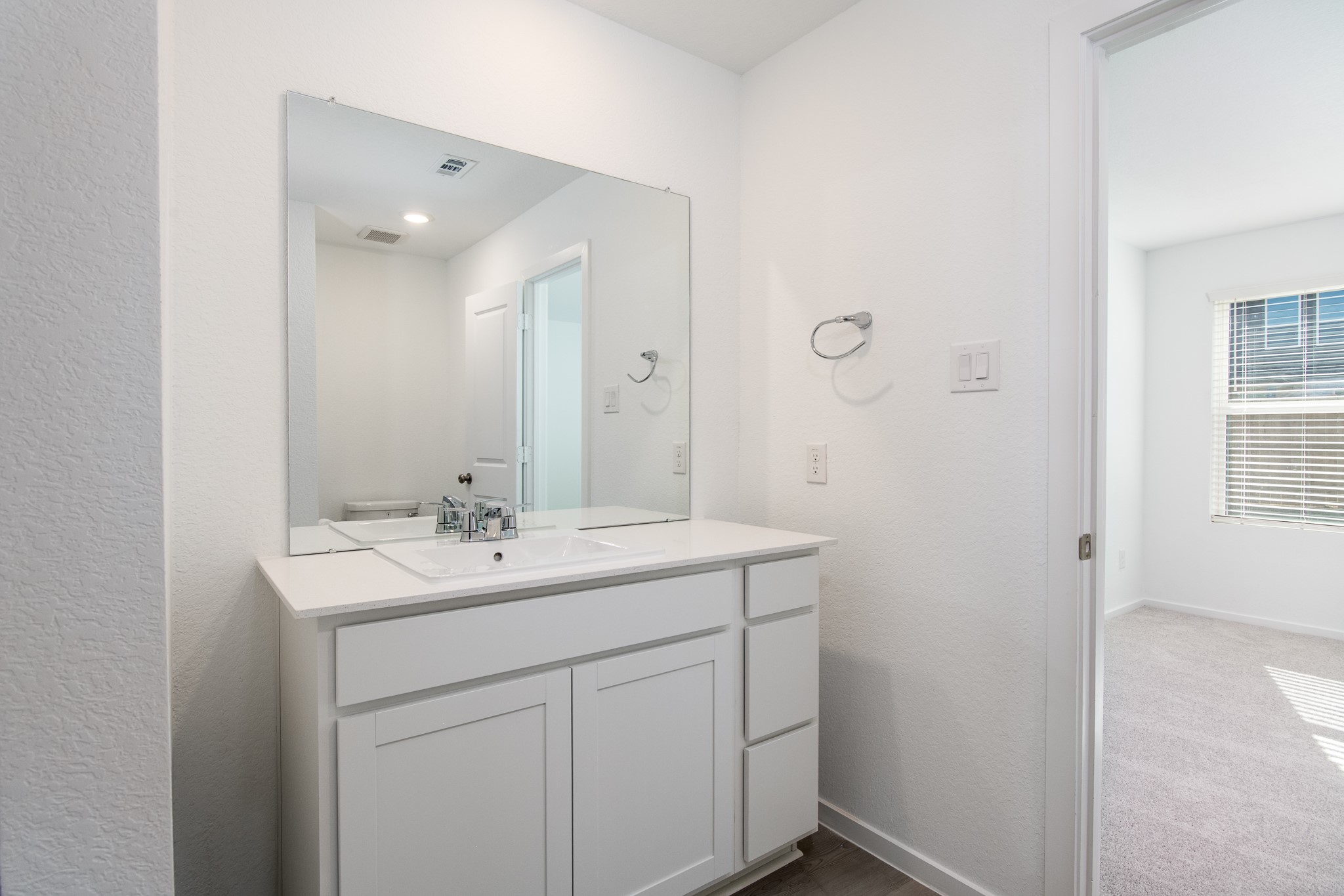 3013 Colusa Rdg Drive Katy, TX 77493 - Photo 9 of 15 a bathroom with a sink a light fixture and a mirror