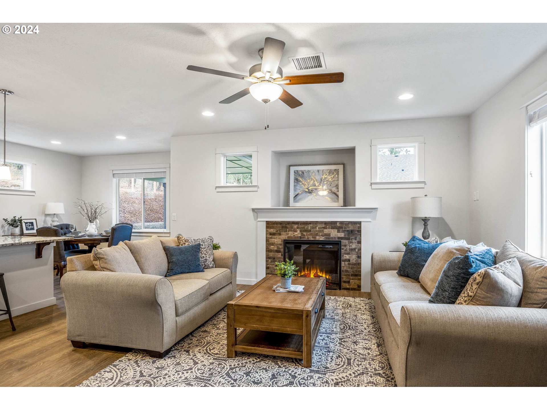 4972 Cedar View Drive Springfield, OR 97478 - Photo 3 of 17 a living room with furniture and a fireplace