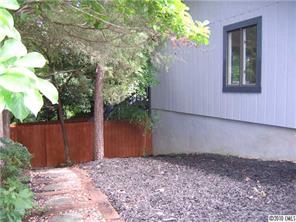 3112 Point Clear Drive Tega Cay, SC 29708 - Photo 3 of 16 a backyard of a house