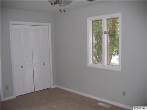 3112 Point Clear Drive Tega Cay, SC 29708 - Photo 10 of 16 a view of an empty room with a window