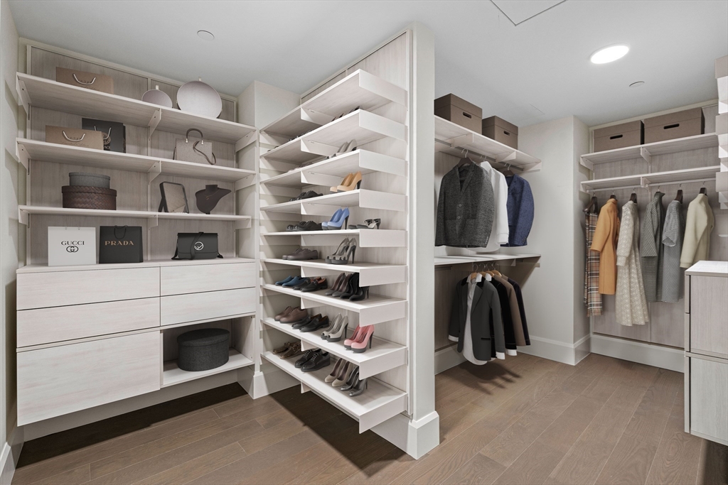 40 Trinity Place, Unit 23C Boston, MA 02116 - Photo 12 of 41 a view of walk in closet with clothes and shoes