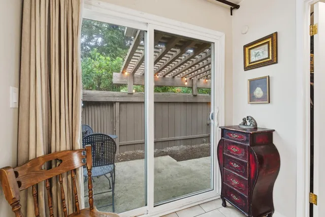 a view of balcony with patio