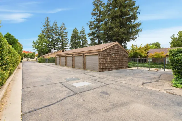 a view of a house with a backyard porch and sitting area