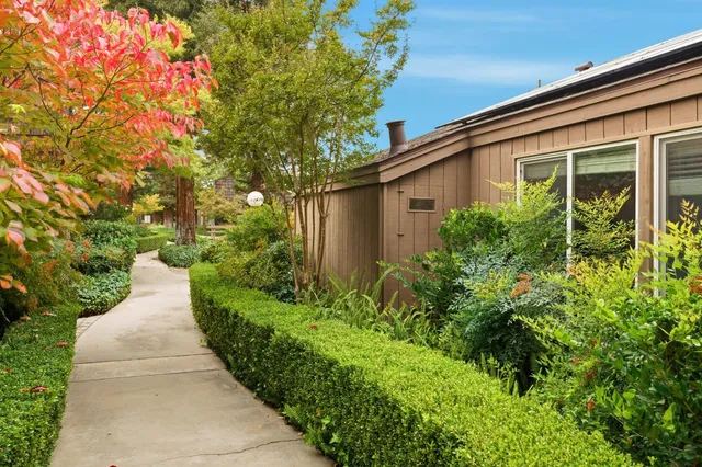 a view of a swimming pool with a patio