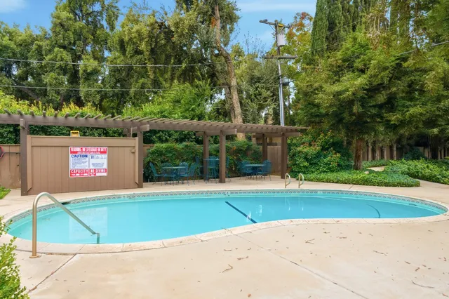 a aerial view of a house with a yard