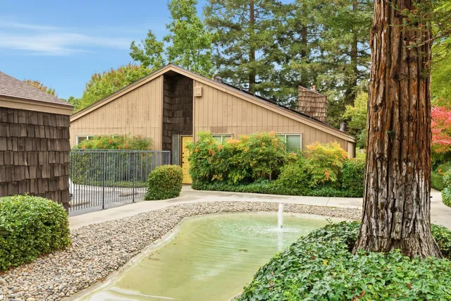 a view of a livingroom with furniture and front door
