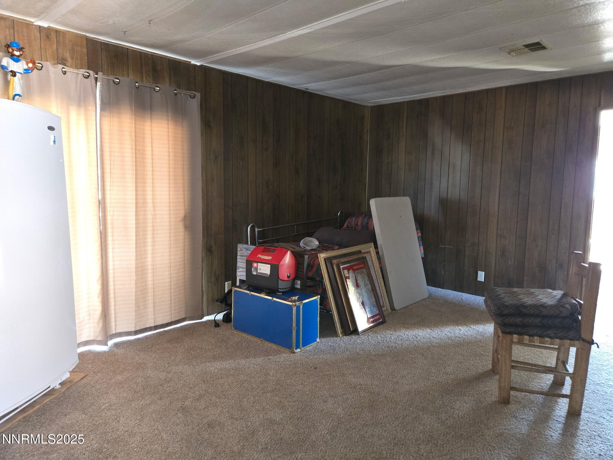 1340 Topaz Ranch Drive Topaz Ranch Estates, NV 89444 - Photo 18 of 20 a room with furniture and window