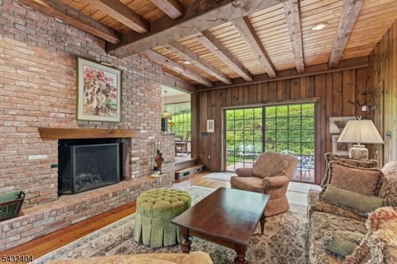 13 Hamden Road Flemington, NJ 08822 - Photo 21 of 37 a living room with furniture and a fireplace