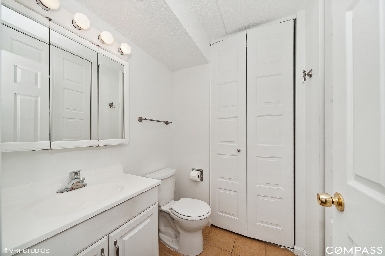 575 Fairway View Drive, Unit 2F Wheeling, IL 60090 - Photo 11 of 14 a bathroom with a granite countertop sink toilet and shower