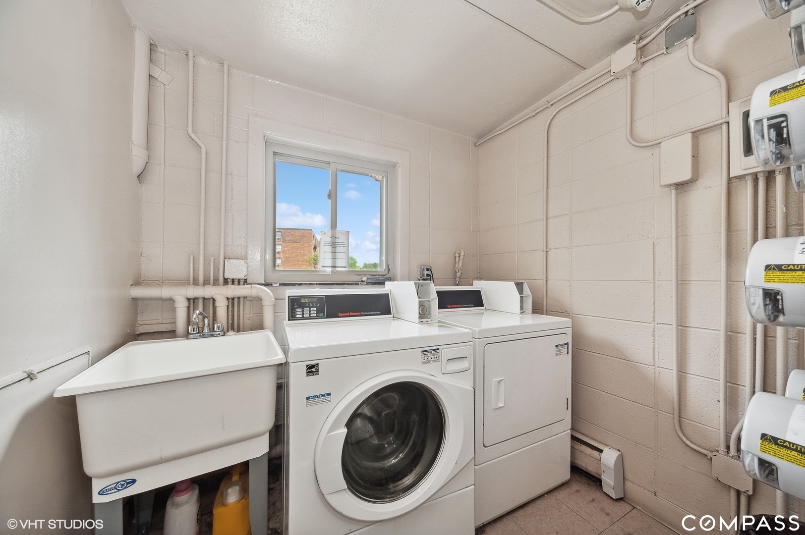 575 Fairway View Drive, Unit 2F Wheeling, IL 60090 - Photo 13 of 14 a utility room with dryer and washer