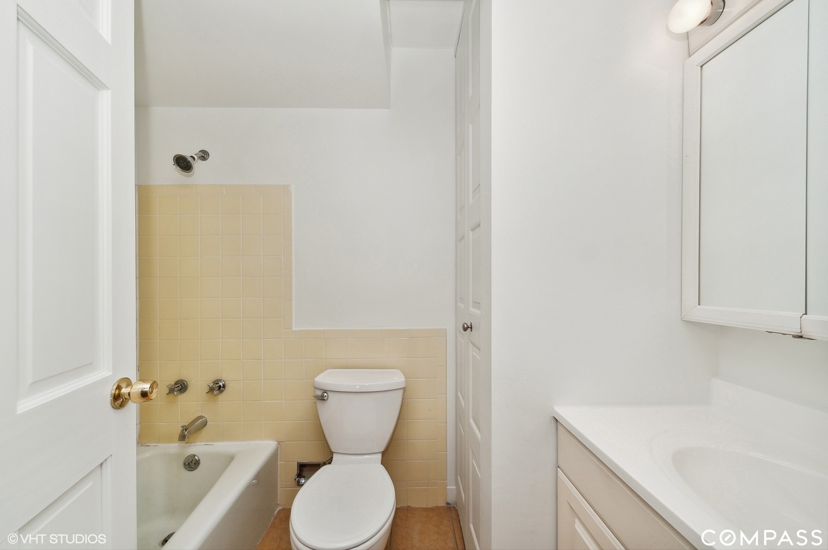 575 Fairway View Drive, Unit 2F Wheeling, IL 60090 - Photo 10 of 14 a bathroom with a sink and toilet