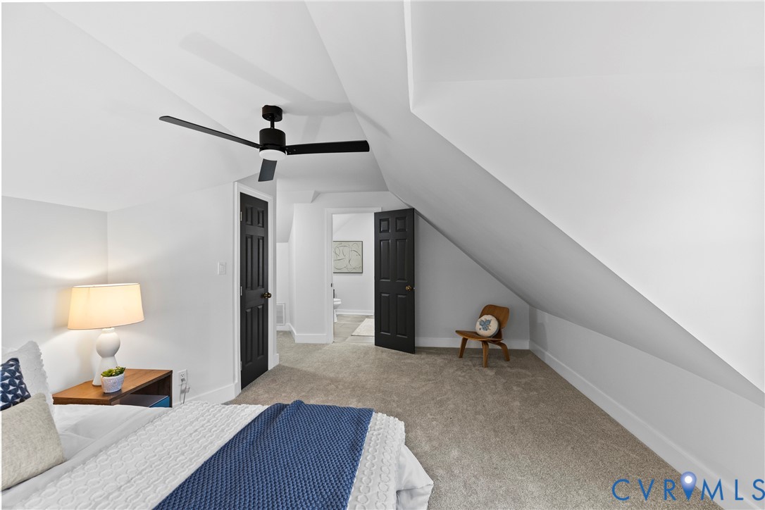 821 Fort Lee Road Petersburg, VA 23803 - Photo 28 of 45 Carpeted flooring, vaulted ceiling, and a modern c