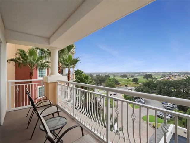 a view of a two chair in the balcony