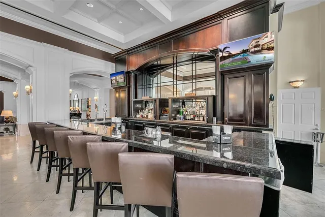 a kitchen with stainless steel appliances granite countertop a stove and a sink