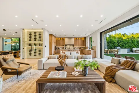 a kitchen with a stove and a refrigerator