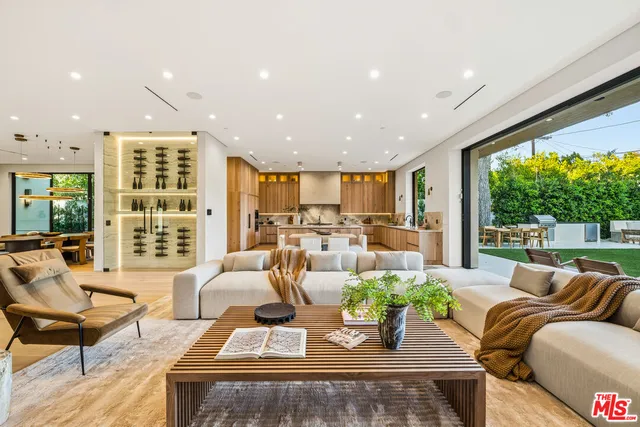 a kitchen with a stove and a refrigerator