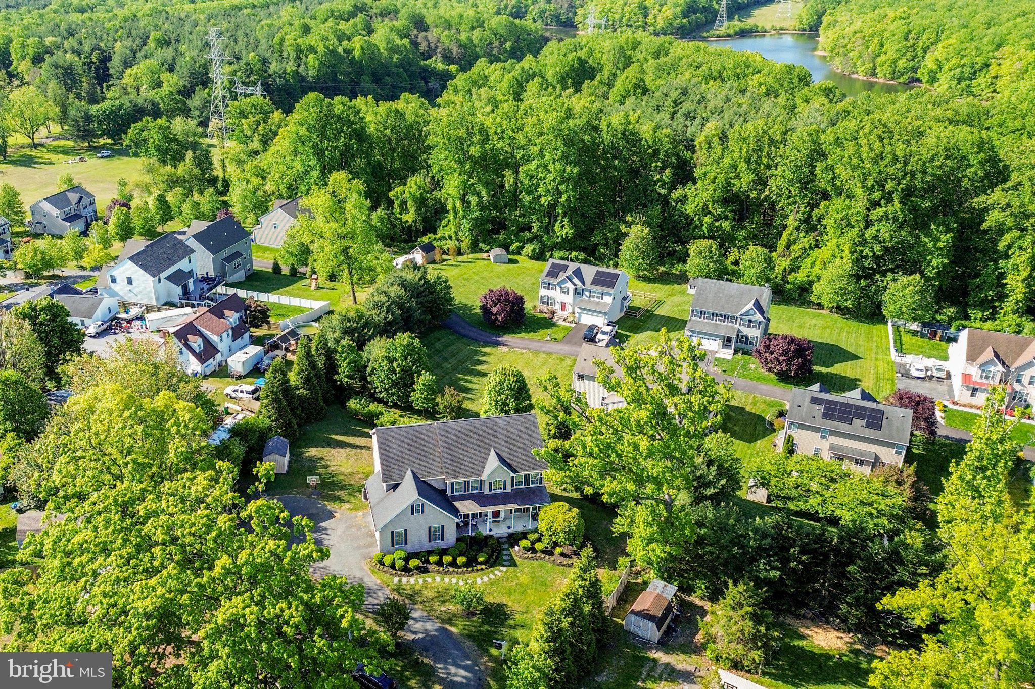 10693 Harding Road Laurel, MD 20723 - Photo 50 of 55 Serene homes nestled in lush greenery.