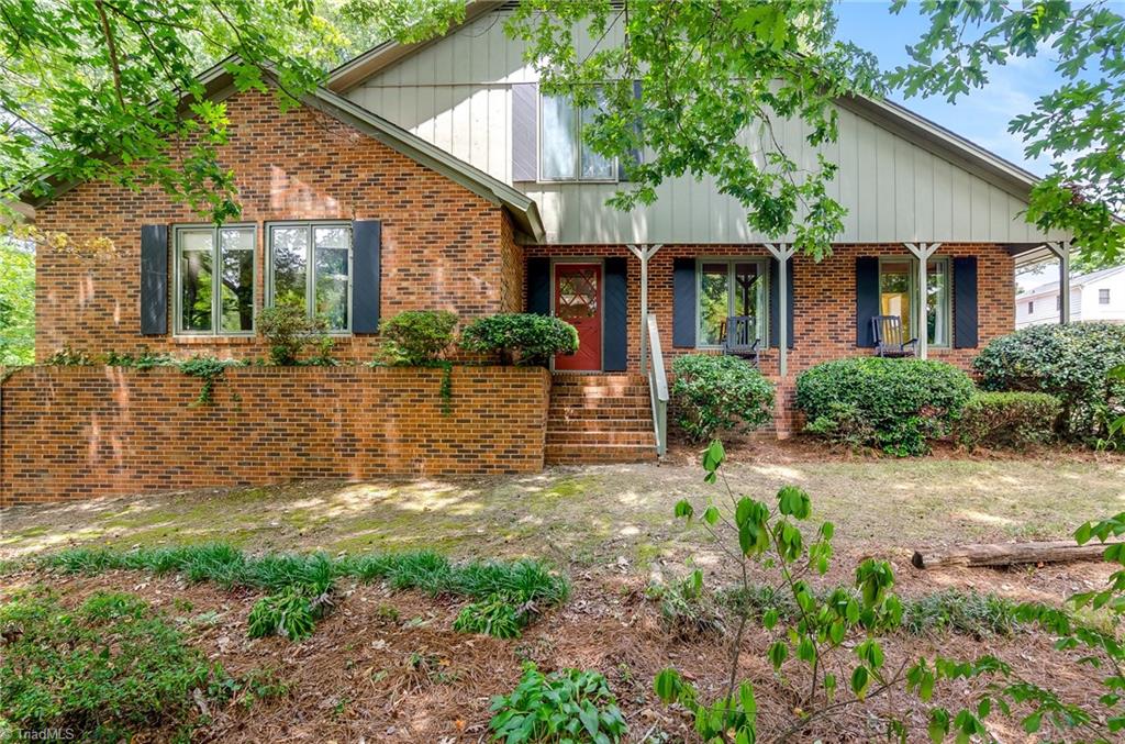 3105 Rolling Road High Point, NC 27265 - Photo 1 of 30 Lovely home sits on culdesac tucked into trees.