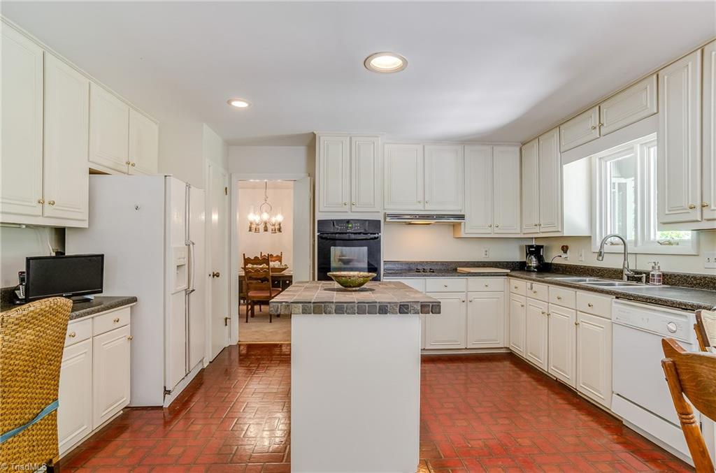 3105 Rolling Road High Point, NC 27265 - Photo 14 of 30 There are tons of cabinets in this kitchen!