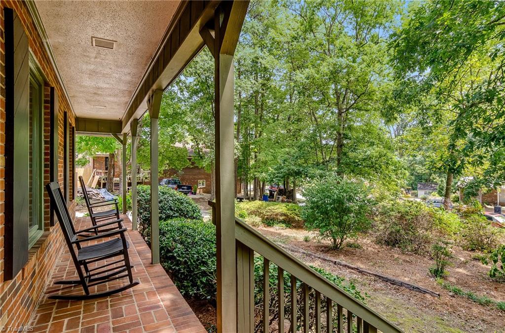 3105 Rolling Road High Point, NC 27265 - Photo 3 of 30 Lovely rocking chair front porch.