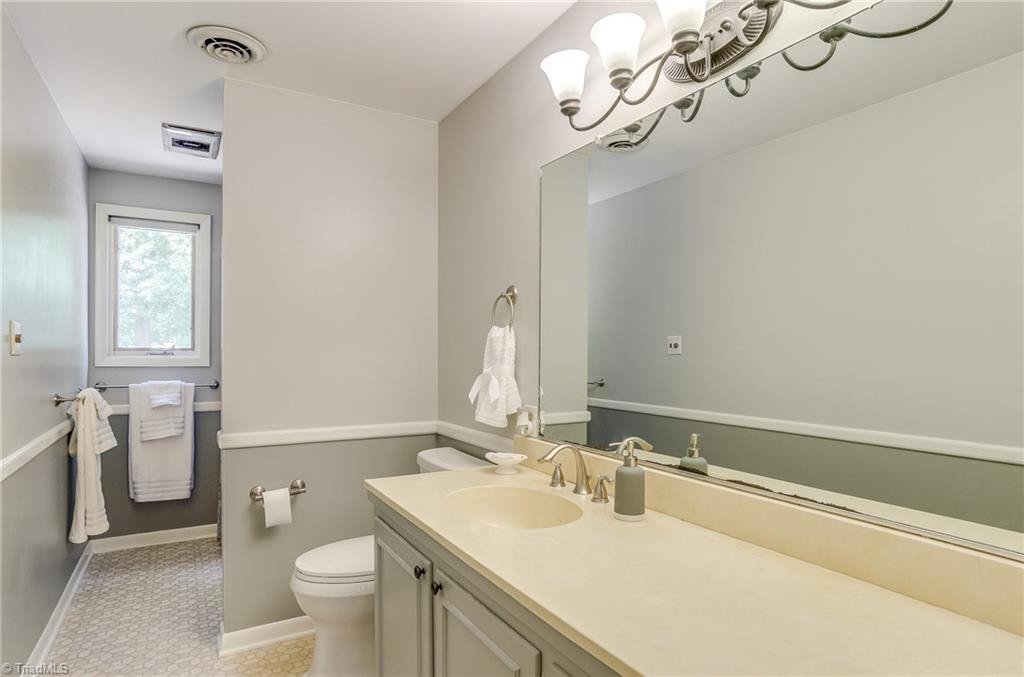 3105 Rolling Road High Point, NC 27265 - Photo 24 of 30 Hall bath shared by second and third bedrooms. Vanity area and lots of counter space!