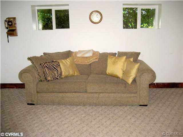 14911 Dry Bridge Road Ruther Glen, VA 22546 - Photo 12 of 12 Den/Family/Great Room - Bright family room in fini