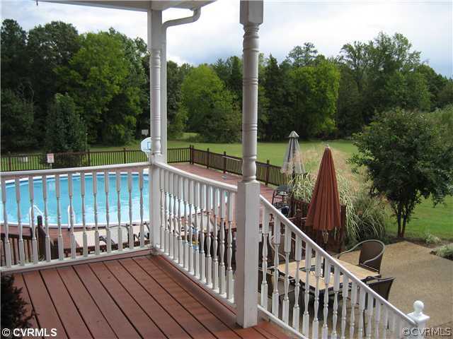 14911 Dry Bridge Road Ruther Glen, VA 22546 - Photo 3 of 12 Patio/Deck - View from Rear Covered Porch showing