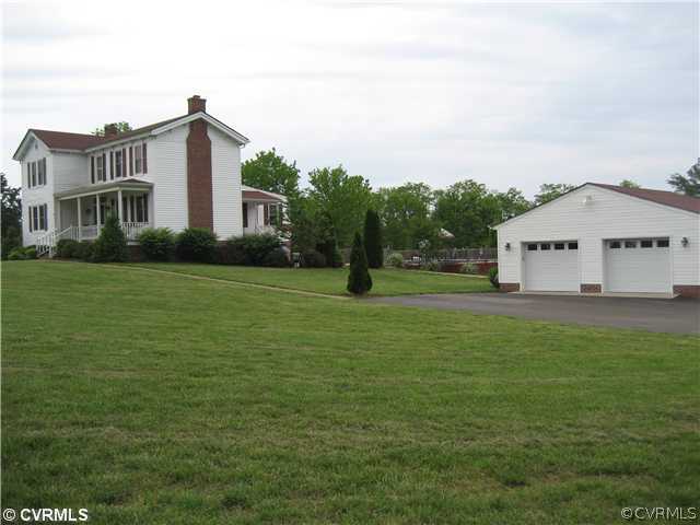 14911 Dry Bridge Road Ruther Glen, VA 22546 - Photo 4 of 12 Exterior Front - View showing home, pool, land and