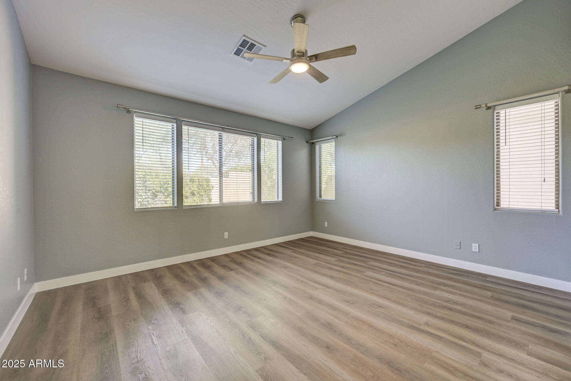 6646 East Rochelle Circle Mesa, AZ 85215 - Photo 19 of 43 a view of an empty room with a window