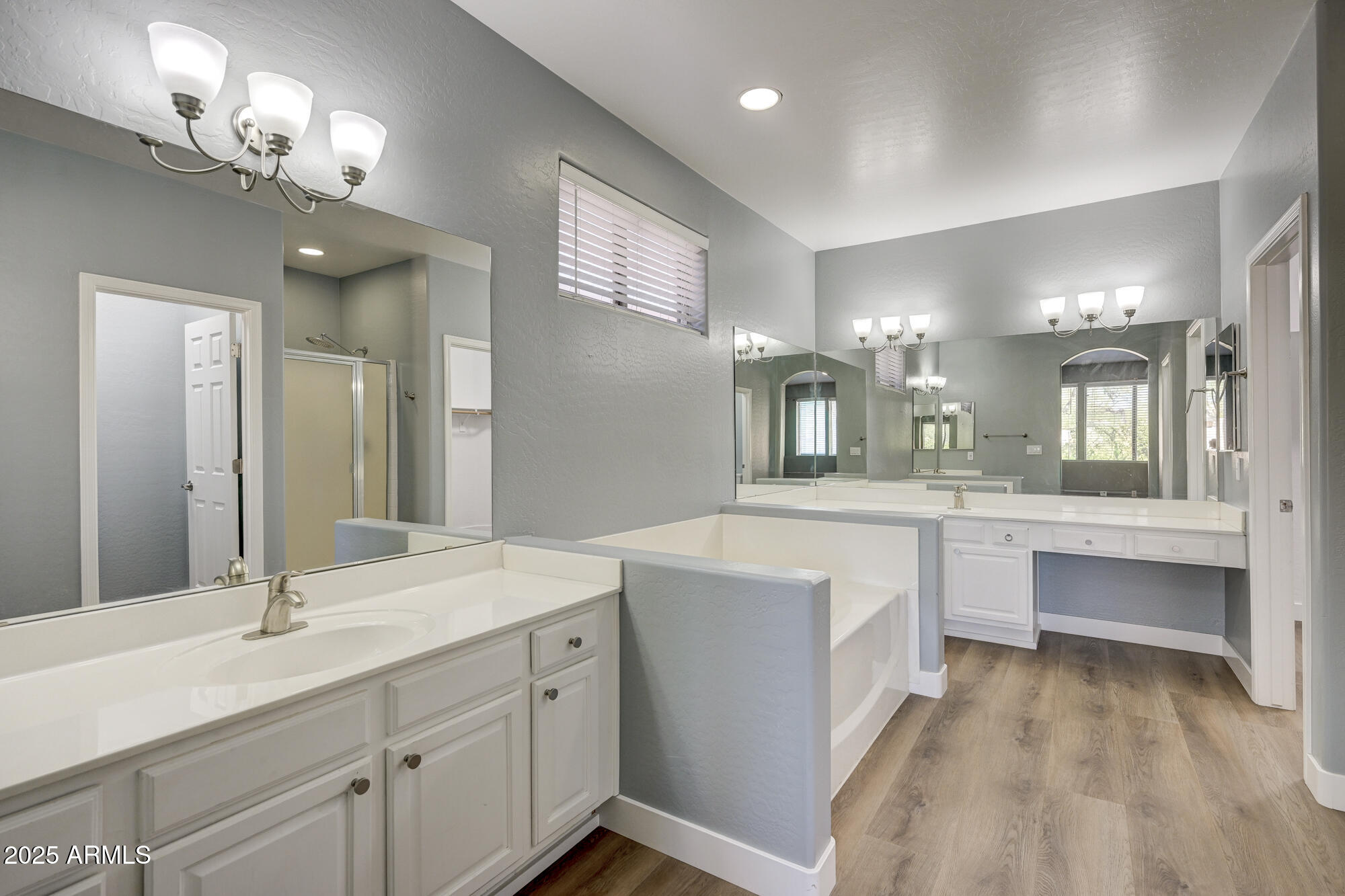 6646 East Rochelle Circle Mesa, AZ 85215 - Photo 22 of 43 a bathroom with a sink double vanity granite and a mirror