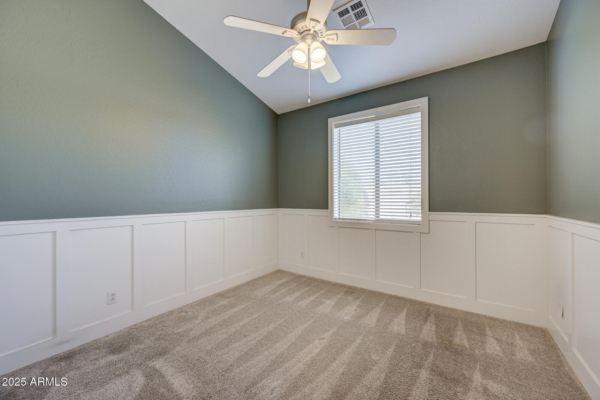 6646 East Rochelle Circle Mesa, AZ 85215 - Photo 30 of 43 wooden floor in an empty room with a window