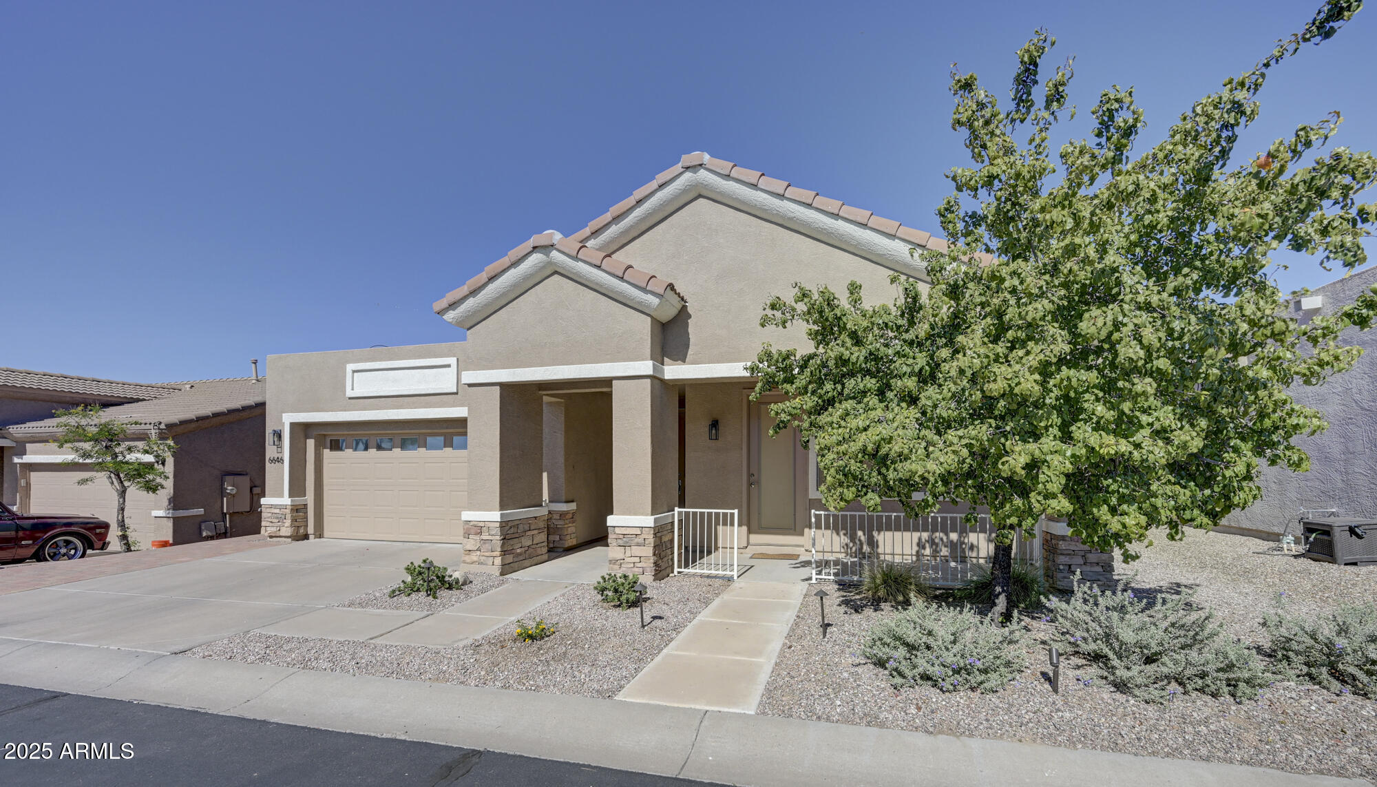 6646 East Rochelle Circle Mesa, AZ 85215 - Photo 3 of 43 a view of a house with a patio