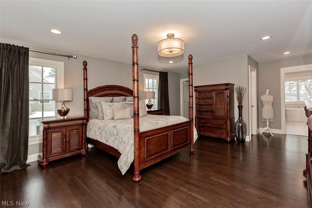 22688 Douglas Road Shaker Heights, OH 44122 - Photo 17 of 28 The master suite has a sitting are, bonus room which is currently used for yoga and treadmill, 2 walk in closets, and a gorgeous spa bathroom with double vanity, seating area, soaking tub, and shower.