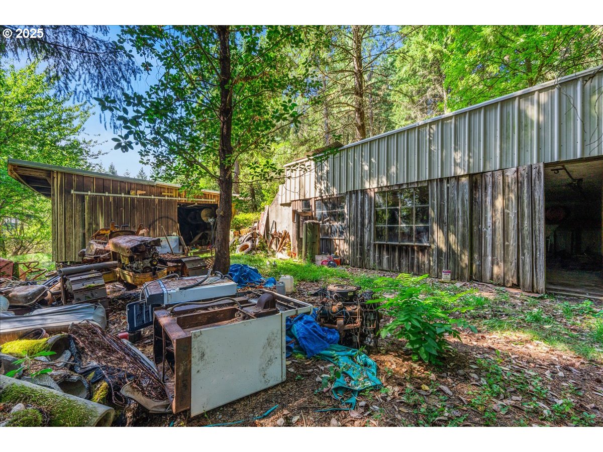18175 Northeast Bald Peak Road Newberg, OR 97132 - Photo 39 of 41 a view of an house with backyard space and garden